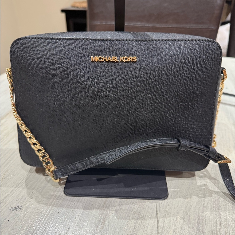 Michael Kors Elegant Black Crossbody Bag with Gold Accents